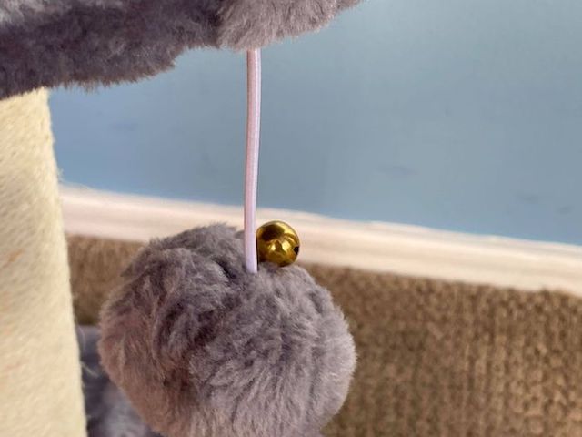 Kitty Cat Post Features a Pom Pom Ball copy