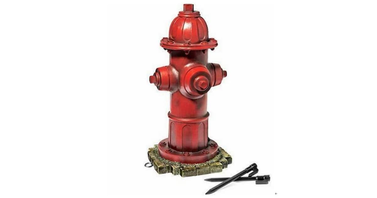 A red fire hydrant dog pee post.